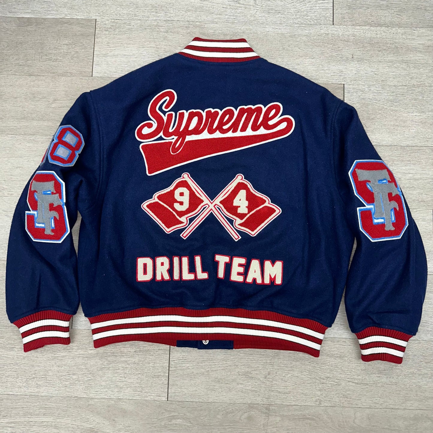 SUPREME DRILL TEAM VARSITY JACKET NAVY